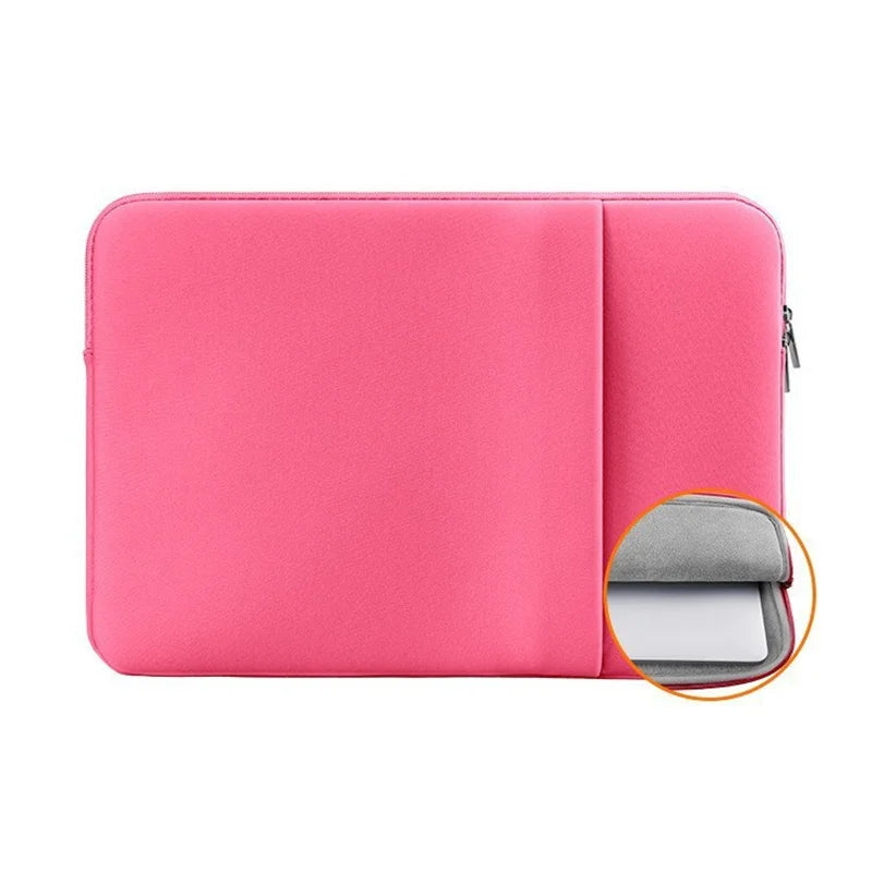 A pink universal laptop sleeve case for 11 to 17 inch laptops, showing the interior gray lining.