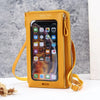 A yellow leather phone case bag with a clear window displaying an iPhone screen.