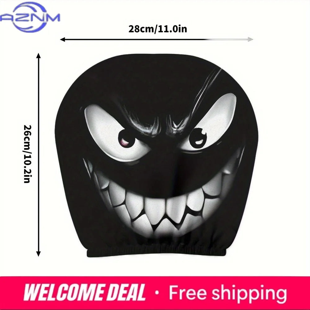 Housse de dossier de voiture décorative noire avec un visage de monstre grinçant et menaçant.