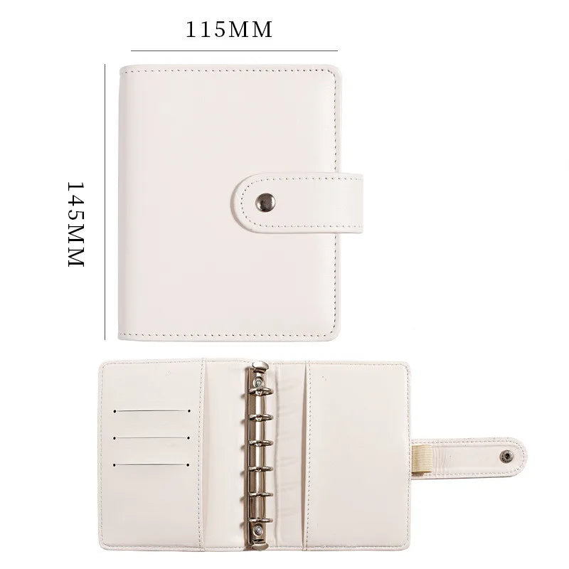 A white leather ring binder notebook with a flap closure shown in two views.