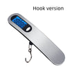 A silver hook version of a portable digital luggage scale displaying 100.00 kg.