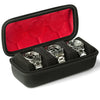 Black watch organizer case with a red velvet lining holding multiple watches