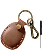 Brown leather card wallet with a built-in pocket for an AirTag and a metal key ring.