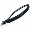 Black handwoven paracord camera wrist strap with a metal clip.