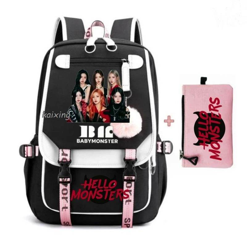Schwarze und pinke Leinwand-Rucksack-Set mit Hello Monsters-Grafiken für Schüler.