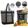 A gray and black heavy-duty insulated cooler bag is shown next to various fruits and vegetables, highlighting its grease-resi