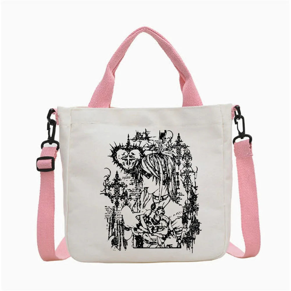 Bolso tote de lona blanca con tiras rosas y una ilustración en línea negra de un cráneo y una figura.