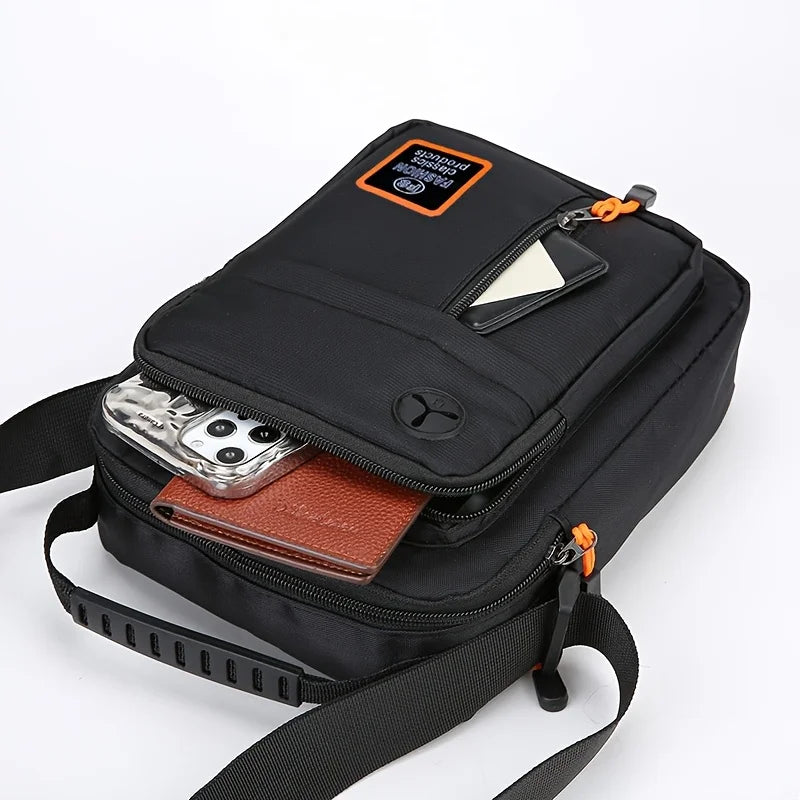 Black men's crossbody sling bag with a flap and an attached leather wallet.
