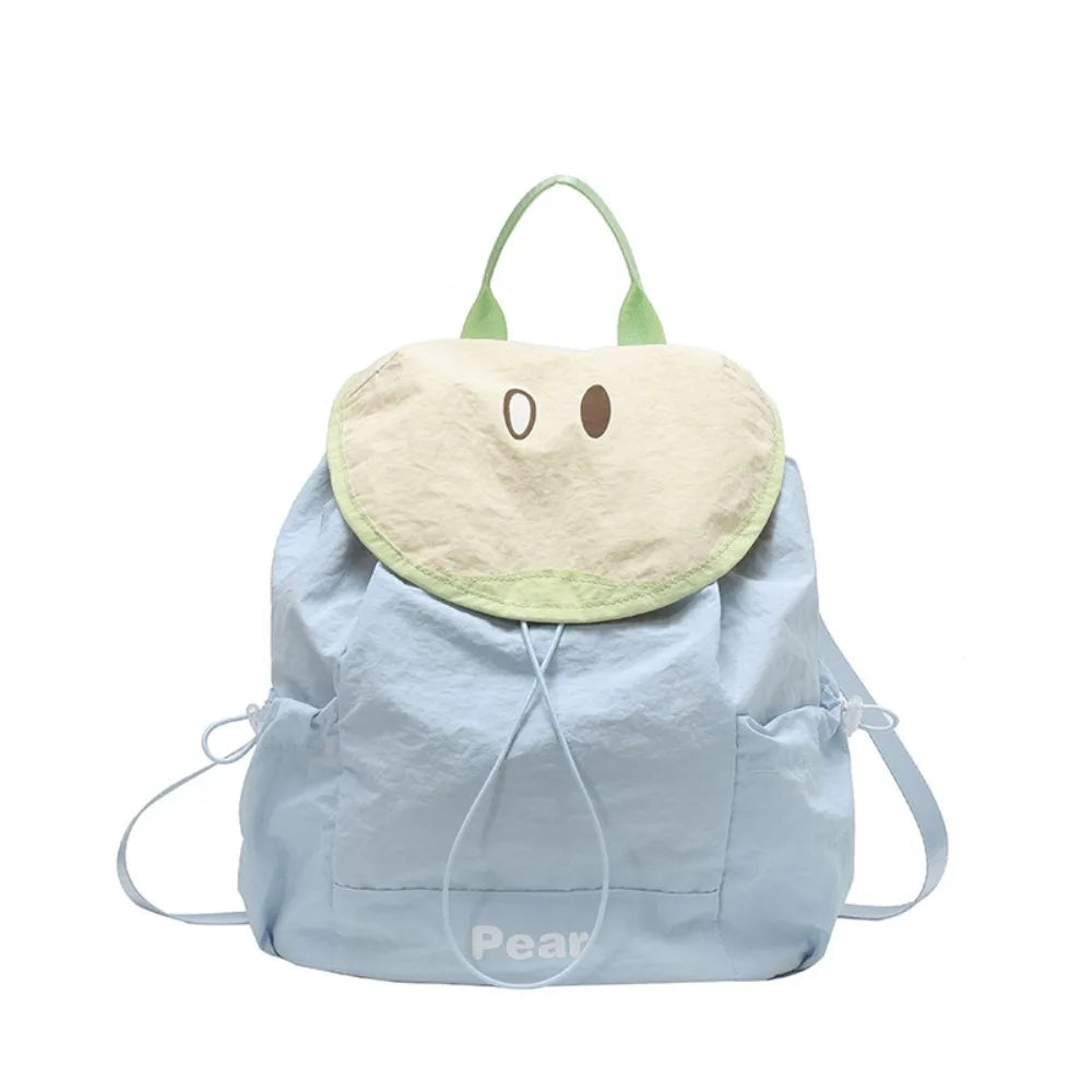 Light blue nylon messenger backpack with a pale yellow fabric flap and green straps
