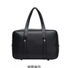 Black leather shoulder bag with a handle shown from the back