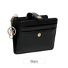 A black minimalist RFID blocking wallet with a leather strap and gold-toned hardware.