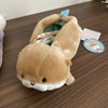 A light brown otter plush toy is shown with its opening, revealing a pencil case inside.