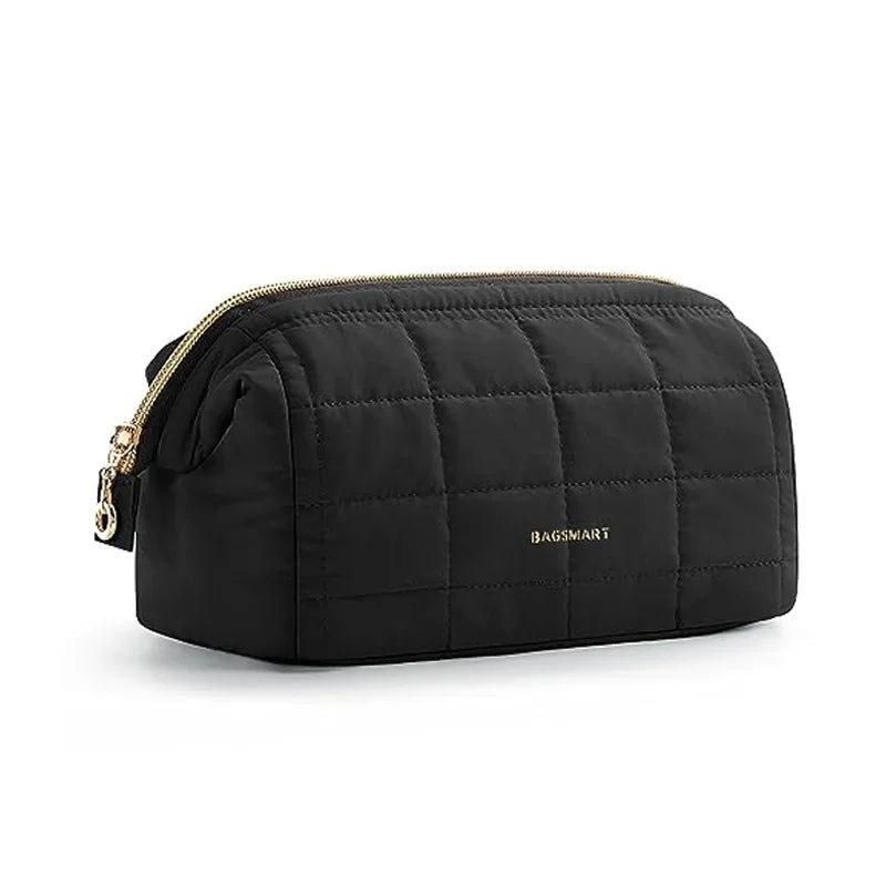 Black padded makeup bag with a wide-open design and gold zipper detail.