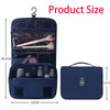 Dunkelblaue portable Reise-Toilettenorganizertasche mit offenem Fach, das eine Bürste und einen separaten Zippere zeigt