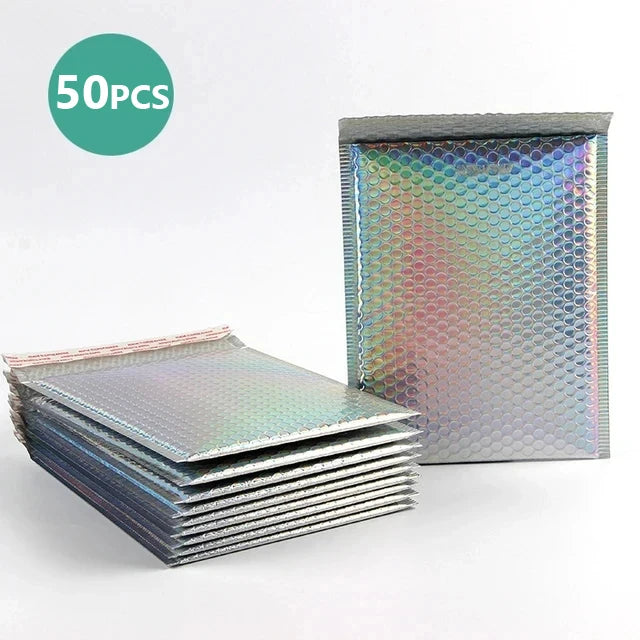 A stack of 50 holographic bubble mailers with self-seal closures is shown next to their packaging.