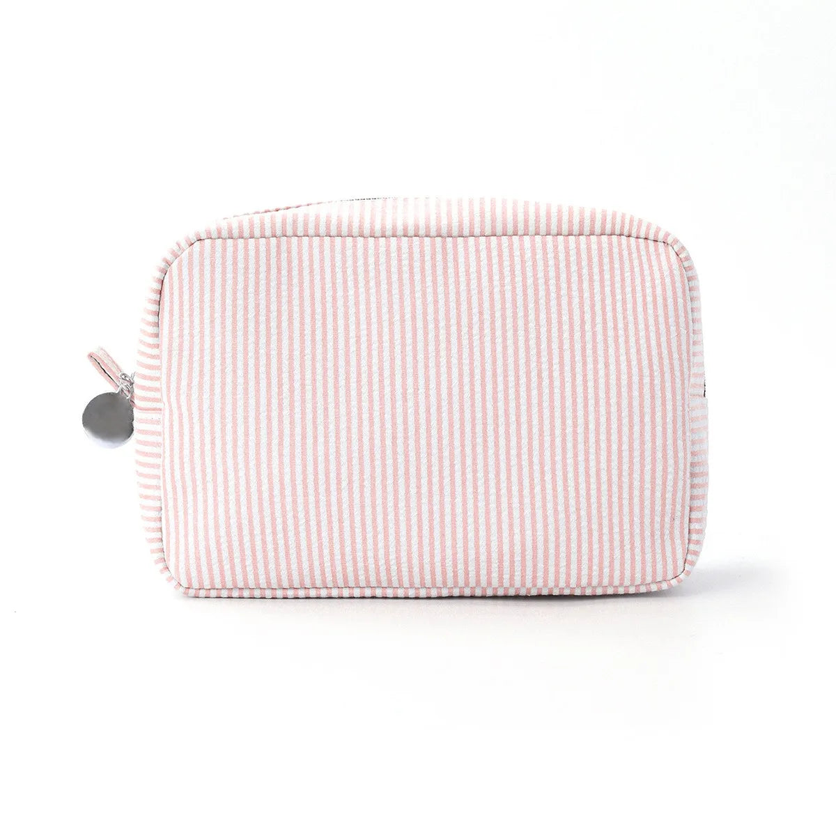 A pink and white striped seersucker cosmetic bag with a zipper closure.