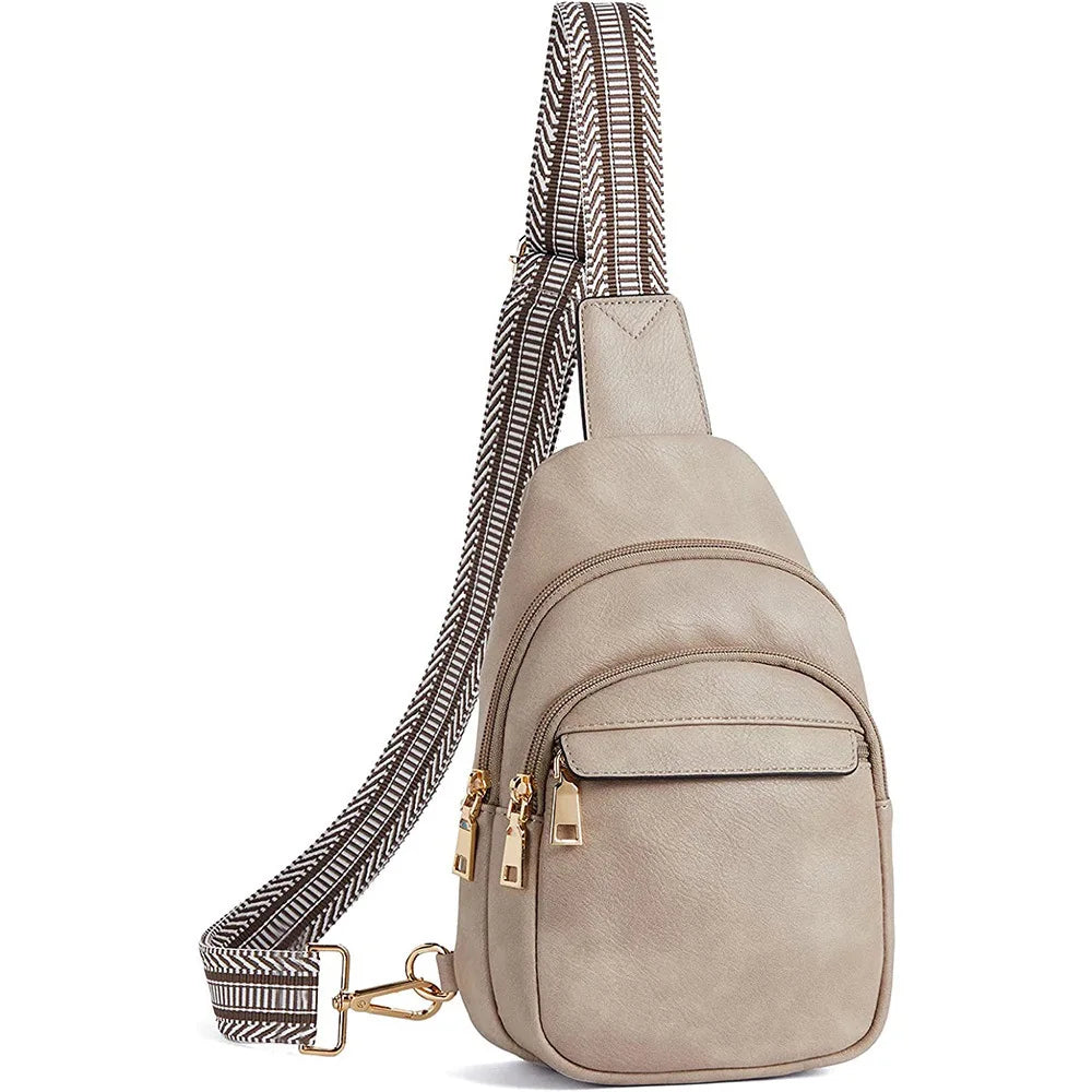 A beige PU leather chest sling bag with a striped brown strap and gold hardware.