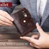 A hand holds a dark brown genuine leather bifold wallet with a double zipper and RFID protection against a gray suit jacket.