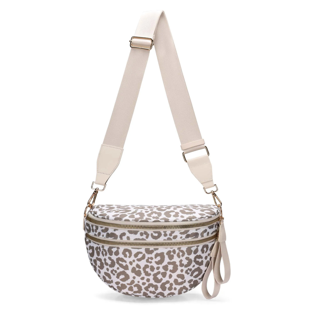 A beige nylon crossbody bag with a leopard print pattern and tan leather straps.