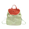 A light green nylon messenger backpack with an orange watermelon-shaped fabric flap and white drawstrings.
