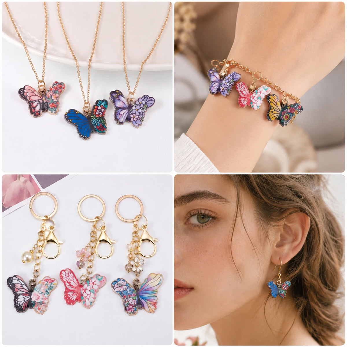 A set of colorful butterfly enamel charms and jewelry displayed on a white background and worn on a wrist.