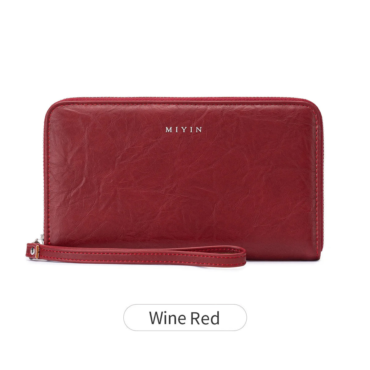 A maroon leather wallet with a zipper closure and the brand name MIYIN visible on the surface.