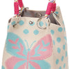 A knitted bucket bag featuring a light beige background with pink and blue polka dots and a large pink and blue butterfly des