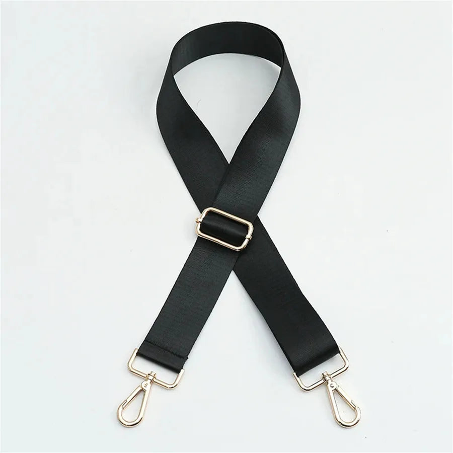 Black adjustable crossbody strap with gold-toned hardware
