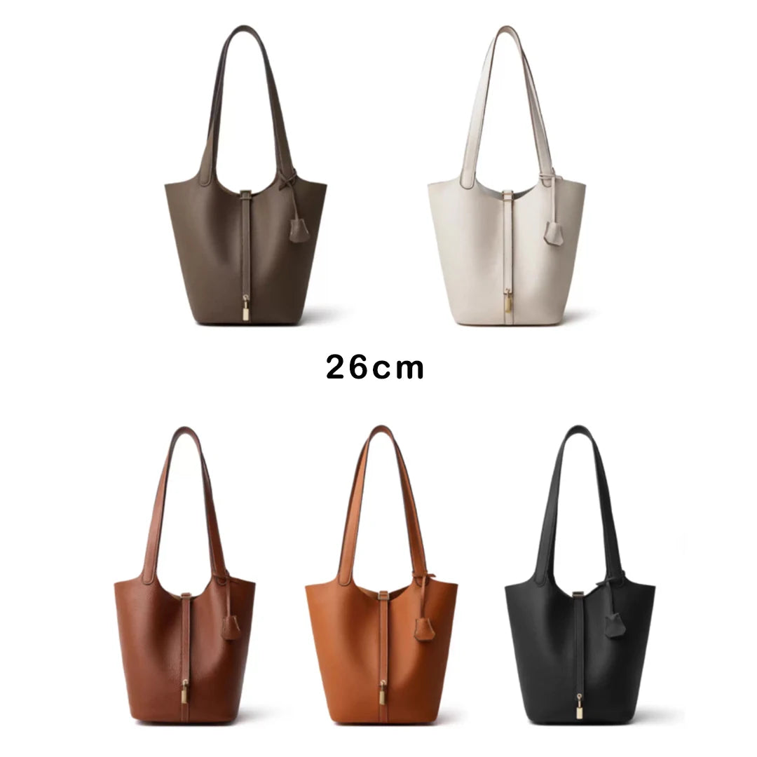 Three classic genuine leather bucket bags in brown, beige, and black.