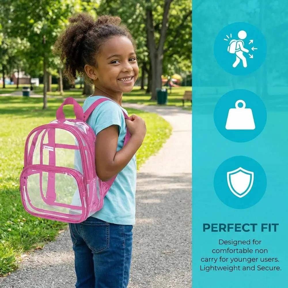 A smiling young girl wearing a pink transparent PVC daypack while walking on a paved path in a park.