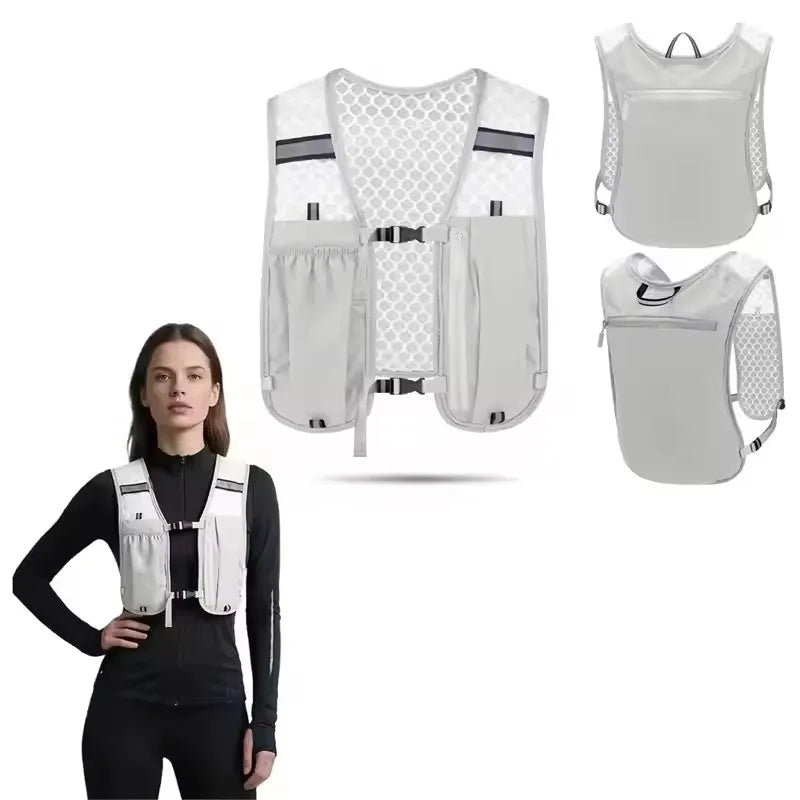 A white hydration vest backpack shown on a model, featuring mesh and padded compartments.