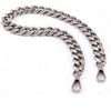 A silver stainless steel diamond-cut curb chain bag strap coiled on a white background.