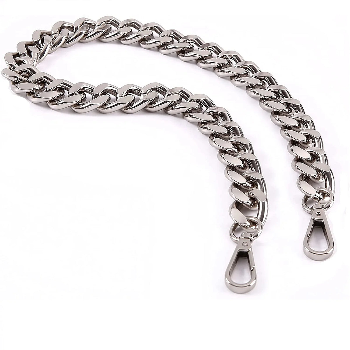 A silver stainless steel diamond-cut curb chain bag strap coiled on a white background.