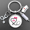 Silver keychain featuring a heart and stethoscope design with the initials RN and a medical cross symbol