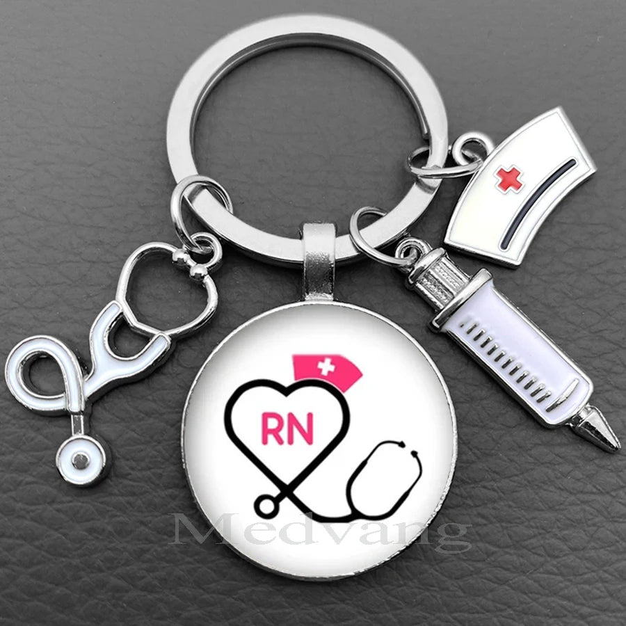 Silver keychain featuring a heart and stethoscope design with the initials RN and a medical cross symbol