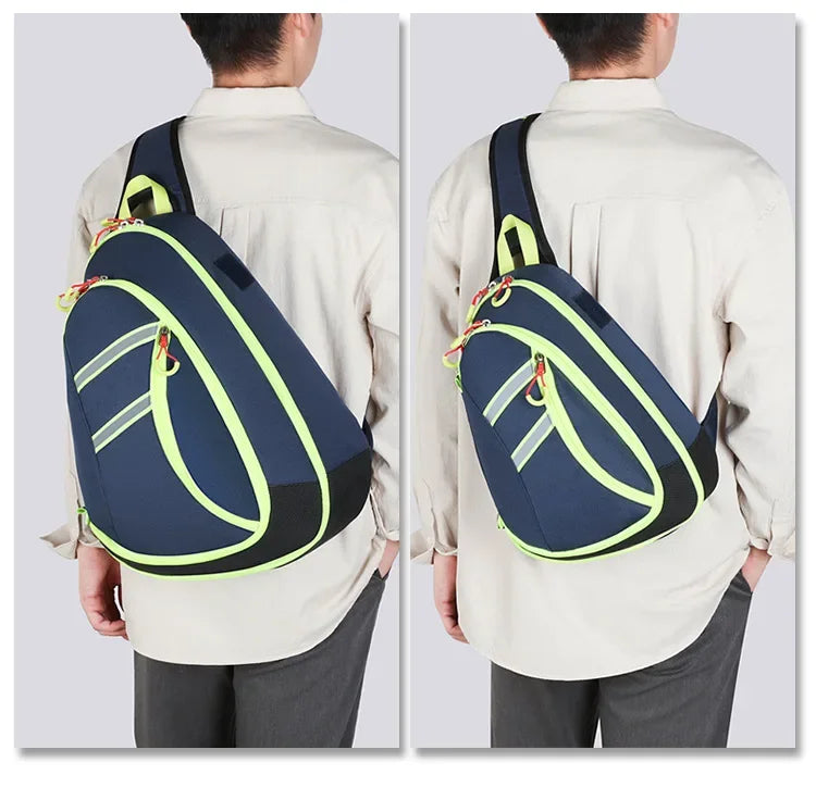 A person is shown wearing a navy blue medical crossbody bag with neon yellow accents over a light-colored shirt.
