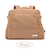 Three versions of a soft corduroy diaper backpack in khaki, brown, and pink shown from the back.