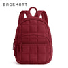 A maroon quilted laptop backpack with a flap closure and shoulder straps.