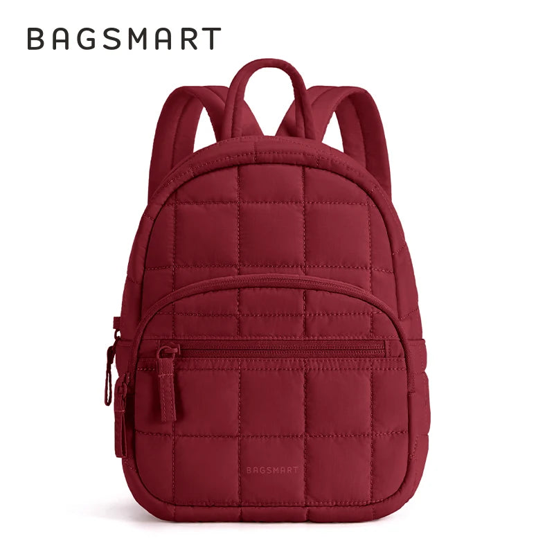 A maroon quilted laptop backpack with a flap closure and shoulder straps.