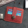 A reddish-brown genuine leather card wallet with a stitched edge and a coin-shaped closure, displaying credit cards.