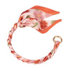 Rosa Blumen-Seidenschal-Tasche mit geflochtenem Kordel und Goldring.
