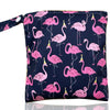A pack of reusable waterproof snack bags featuring pink flamingos on a navy blue background with a gold trim.