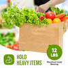 A brown kraft paper gift bag filled with fresh vegetables including lettuce, tomatoes, carrots, and bell peppers.