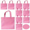A set of pink non-woven tote bags in various sizes and styles for parties and gifting