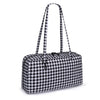 A black and white checkered nylon shoulder tote bag with long straps.
