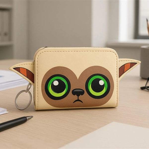 A beige Loungefly avatar wallet shaped like a cartoon monkey with large green eyes and pointed ears.