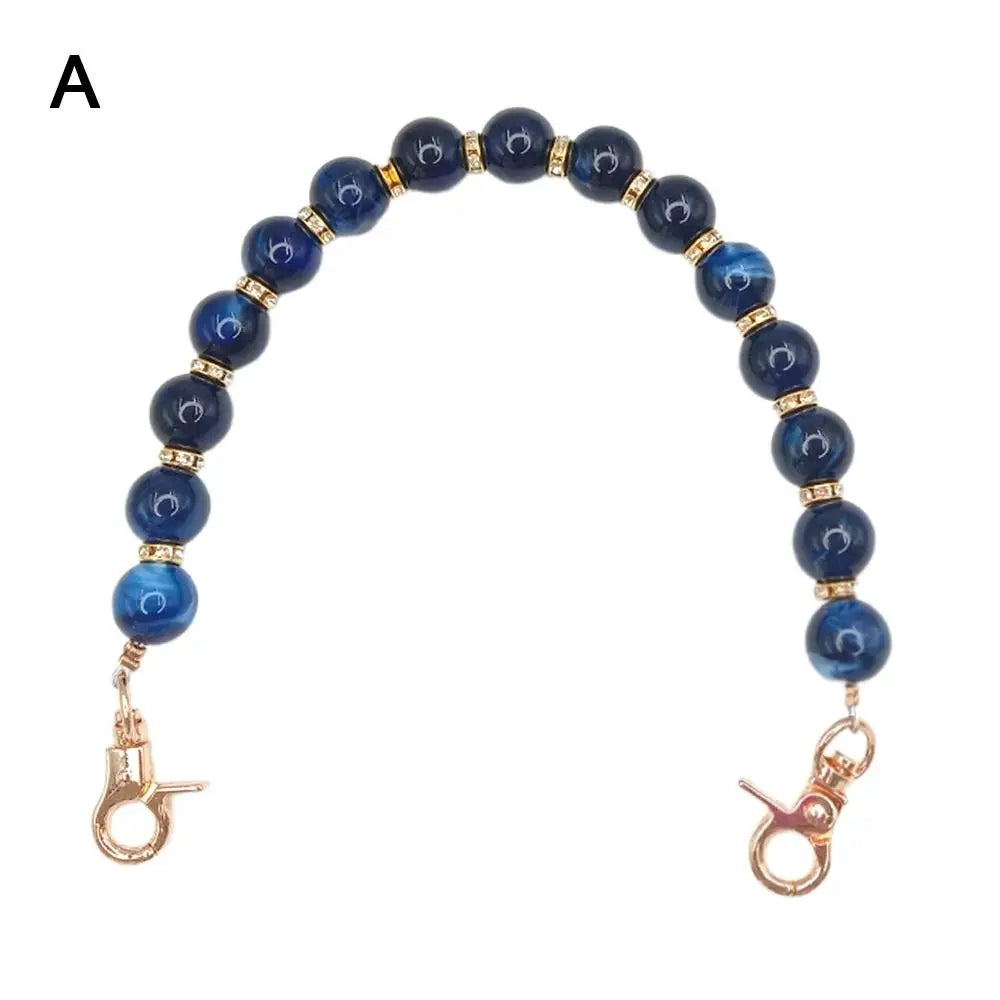 Handcrafted resin stone bead necklace with blue and gold accents