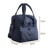 A dark blue double-layer insulated lunch bag with carrying handles and zippered compartments.