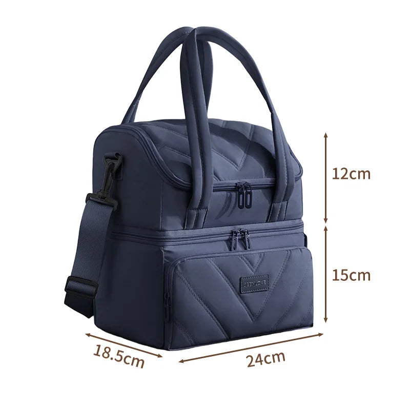 A dark blue double-layer insulated lunch bag with carrying handles and zippered compartments.