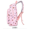 A pink cartoon animal backpack with a gray strap and multiple compartments.